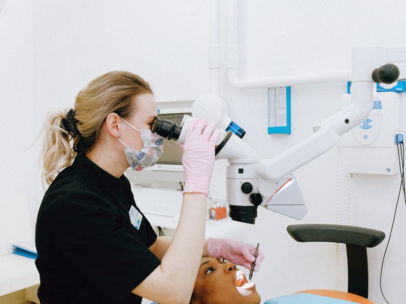 Precision dental surgery with microscope