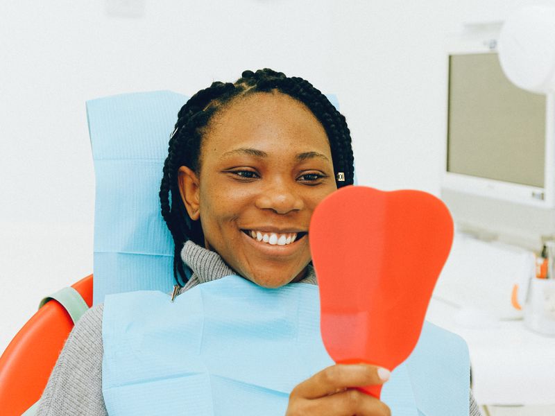 Patient checking smile after whitening